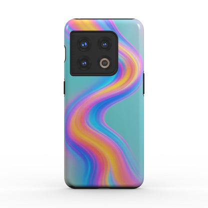 Husă Tough OnePlus cu design abstract wave multicolor pe fundal teal, telefon cu fața în jos pe birou